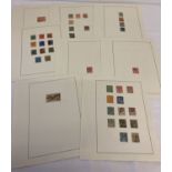 A collection of 38 George V postage stamps, all with frank marks.