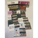 13 sets of Royal Mail British Christmas stamp collectors cards.