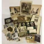 A quantity of assorted vintage black & white photographs to include albums.