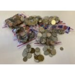 A quantity of vintage foreign coins. To include examples from China, USA, Holland and Denmark.