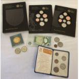 A collection of assorted coins and bank note, some sealed and unopened.