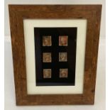 6 Victorian franked penny red stamps, framed and glazed.