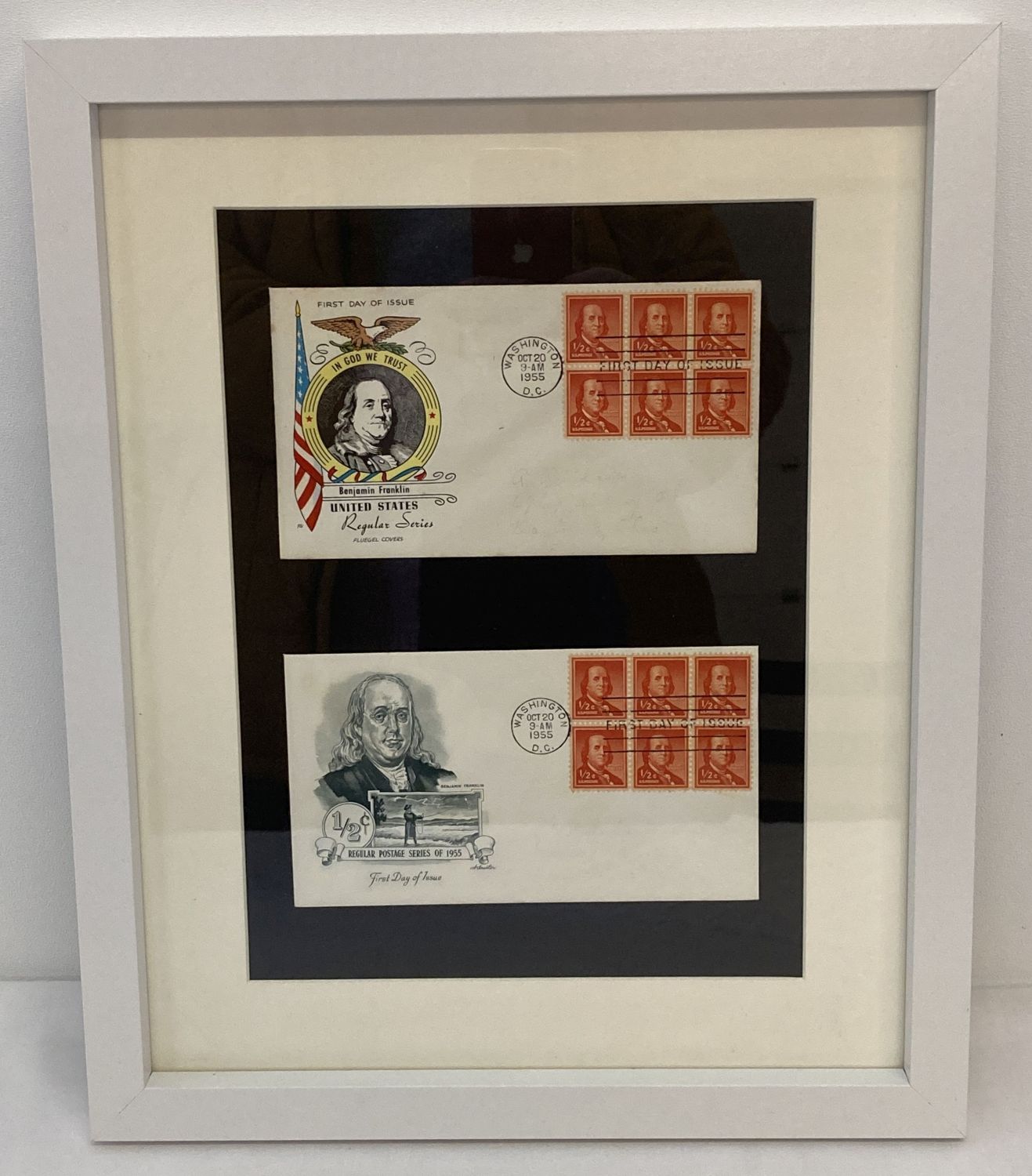 2 1955 American first day covers depicting Benjamin Franklin framed and glazed.