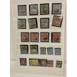 A collection of 23 antique and vintage St. Helena franked and unfranked stamps.