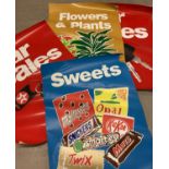 4 large shop advertising posters. 2 x car sales, flowers and plants and sweets.