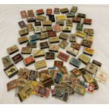 A collection of vintage matchboxes, match books and match box fronts.