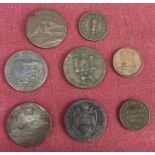 A small collection of 18th and 19th Century token coins and half pennies.