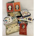 A collection of loose used stamps to include British and foreign some dating from George VI.