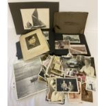 A box of assorted vintage photographs to include albums.