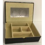 A modern mock crocodile effect jewellery box with cream velveteen interior.