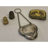 An antique silver chatelaine powder compact with silver gilt interior, small mirror and powder puff.