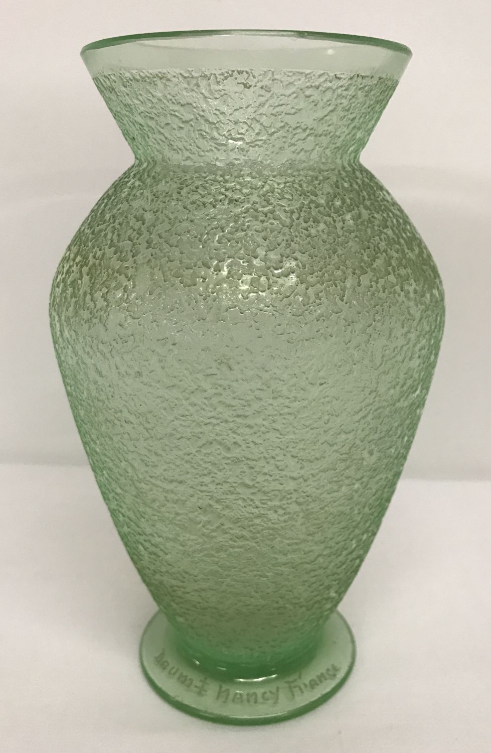 A Daum Nancy Art Deco frosted design pale green glass vase.