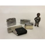 A collection of 5 vintage lighters to include novelty.
