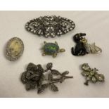 A collection of 6 vintage brooches to include stone set and marcasite's.