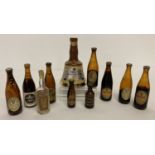 A small collection of vintage collectable miniatures. 6 bottles of Guinness.
