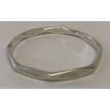 A heavy silver octagonal shaped bangle. Hallmarked Birmingham 1997.