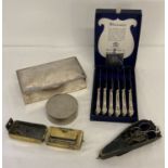 A collection of mixed metal ware to include Mappin & Webb boxed set of butter knives.