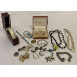 A small collection of vintage and modern costume, silver and white metal jewellery.