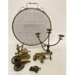 A collection of assorted vintage metal ware items to include brass cannon ornaments and fire screen.