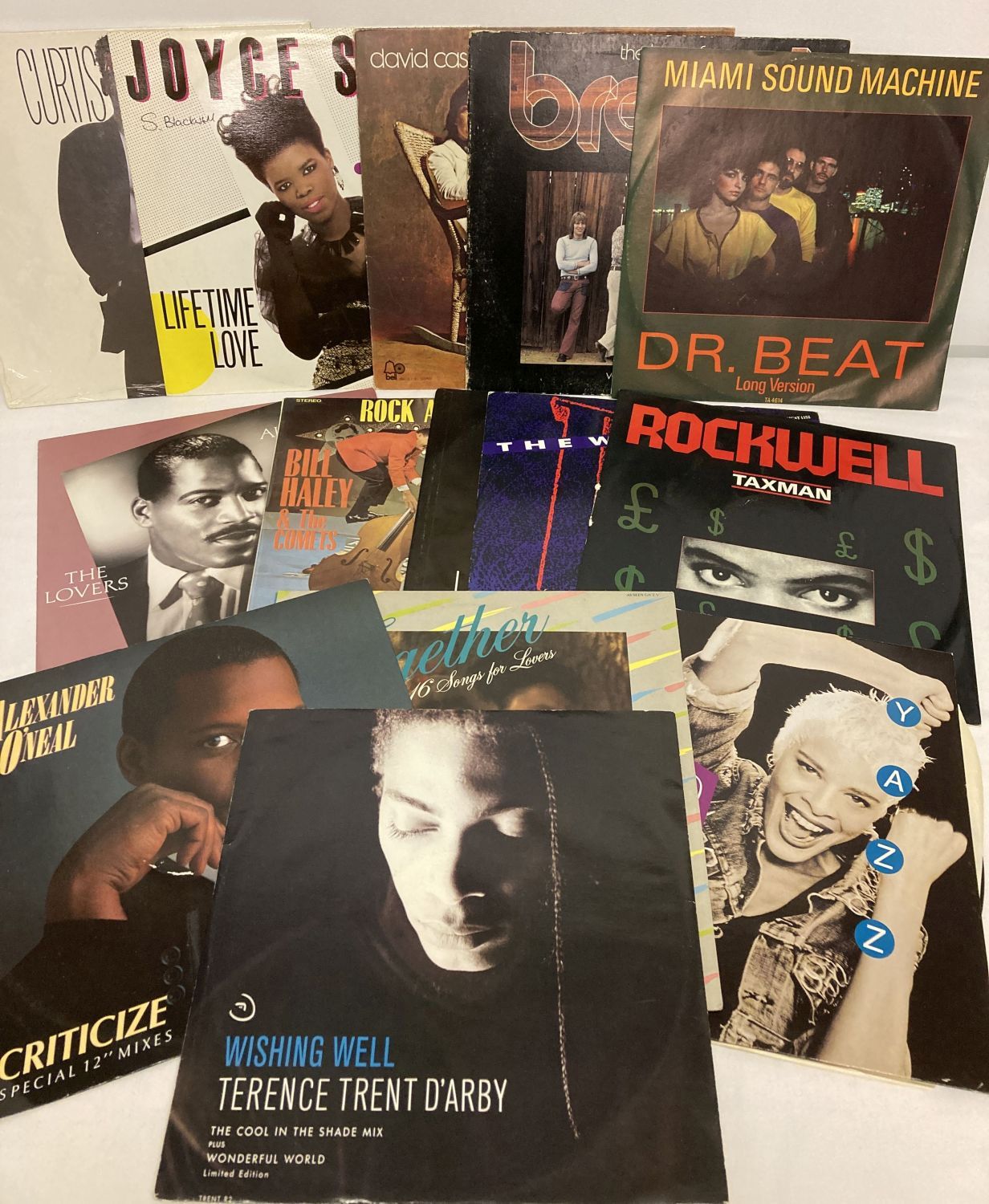 A small collection of vintage LP and 12 inch records.