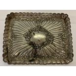 An Edwardian silver decorative square shaped card tray.