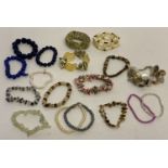 A quantity of assorted vintage costume jewellery bracelets to include natural stone, shell and bone.