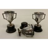 3 small 1930's Chinese silver trophy cups, marked 'TAI HUA', complete with black wooden stands.
