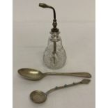 A vintage cut glass perfume bottle with silver collar together with 2 spoons.