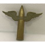 A British WWII style RAF early Air Gunners brass "Winged Bullet" badge.