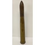 A vintage 60mm brass artillery shell. No marking to base. Inert.