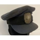 A vintage RAF peaked cap with WWII style Polish Air Force Officers bullion cap badge.