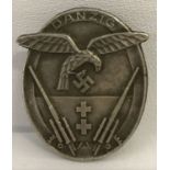 A German WWII style Danzig Flak Unit pin back badge.