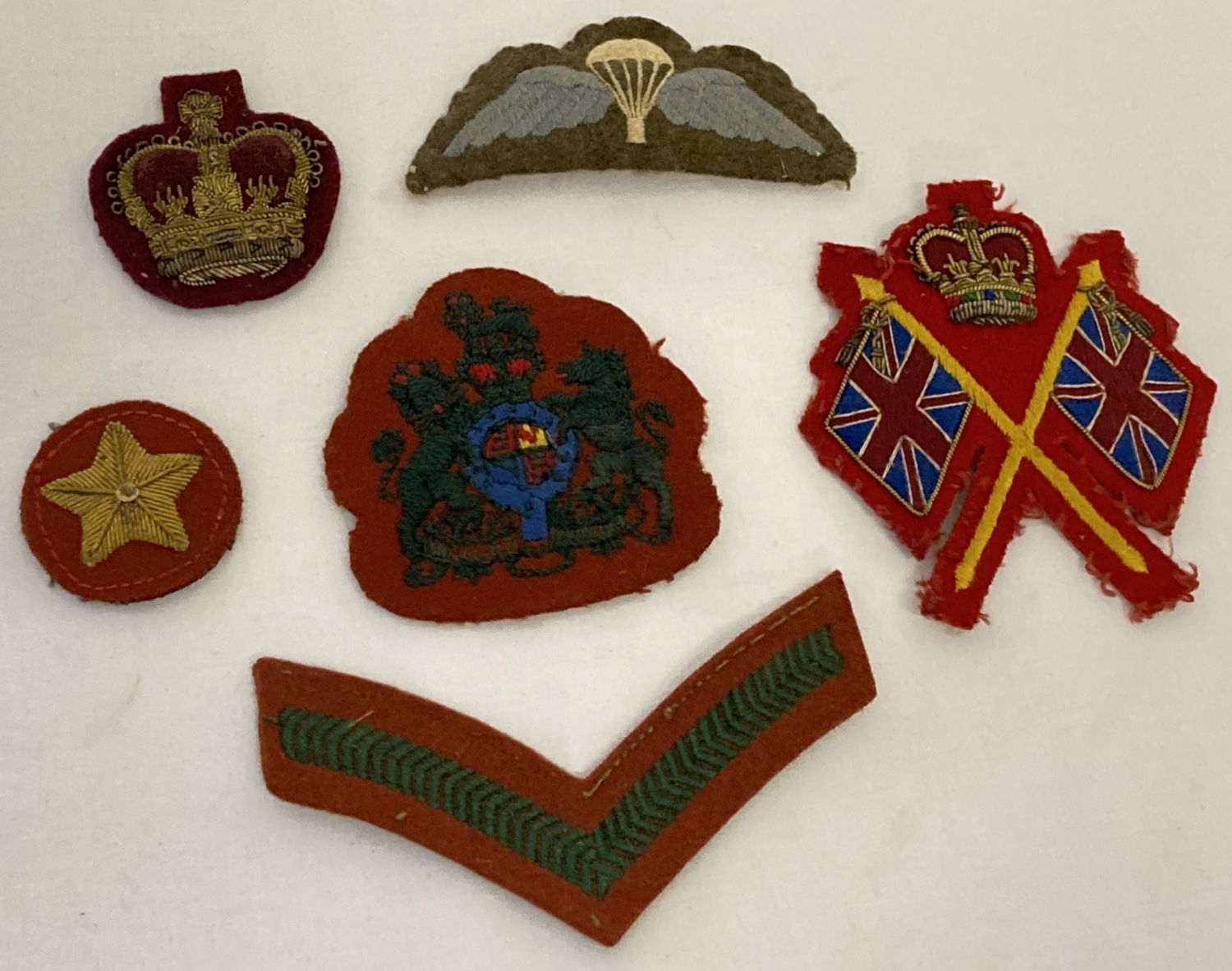 6 vintage military embroidered cloth badges to include bullion examples.