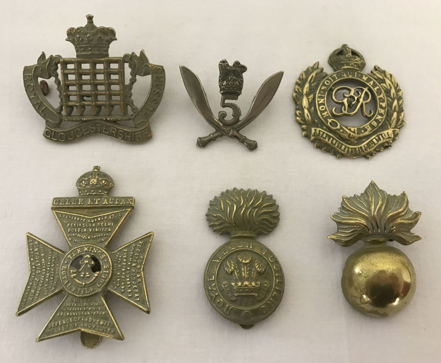 6 assorted British Army cap badges with slider and lug fixings.