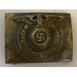 A German WWII style Waffen SS metal belt buckle.