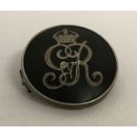A hallmarked silver and shell British Army sweetheart badge.