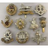 A collection of 10 assorted British Army officers cap badges.