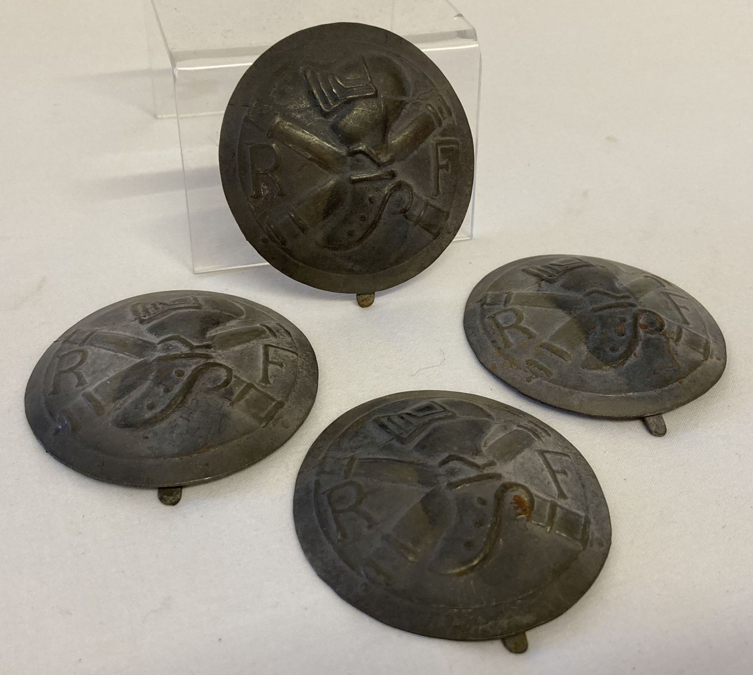 4 French Adriane helmet Tank Corps badges.