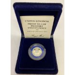 A boxed 1982 silver proof Piedfort 20p coin by Royal Mint. In clear protection case.