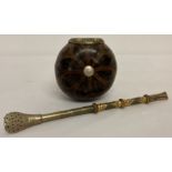 A vintage opium pipe, marked 800, with gilt detail (a/f) together with a hollowed nut opium bowl.