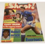 A part front cover of Shoot magazine signed by Everton footballer Adrian Heath.