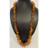 A 28 inch graduating Baltic amber chip necklace.