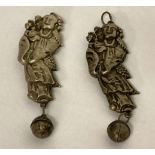 2 Chinese hollow white metal pendants with suspended bells.