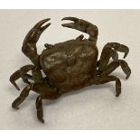 A small bronze figure of a crab.