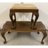 A mahogany upholstered stool with ball & claw feet and carved detail to tops of legs.