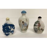 3 Oriental ceramic snuff bottles, 2 with painted detail to both sides.