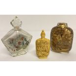 3 Oriental snuff bottles; 2 interior painted glass examples and one carved with dragon detail.