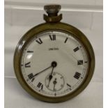 A vintage brass cased pocket watch by Smiths. In working order.