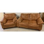 A modern design 2 seater tan leather sofa and matching armchair with square wooden feet
