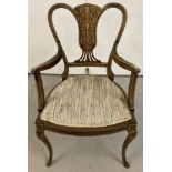 An Edwardian armchair with shaped floral inlaid back panel, slimline cabriole legs to front and